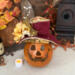 This is a hand carved pumpkin gourd for your fall table decorating. I have carved a happy face into the shell and made a autumn hat.